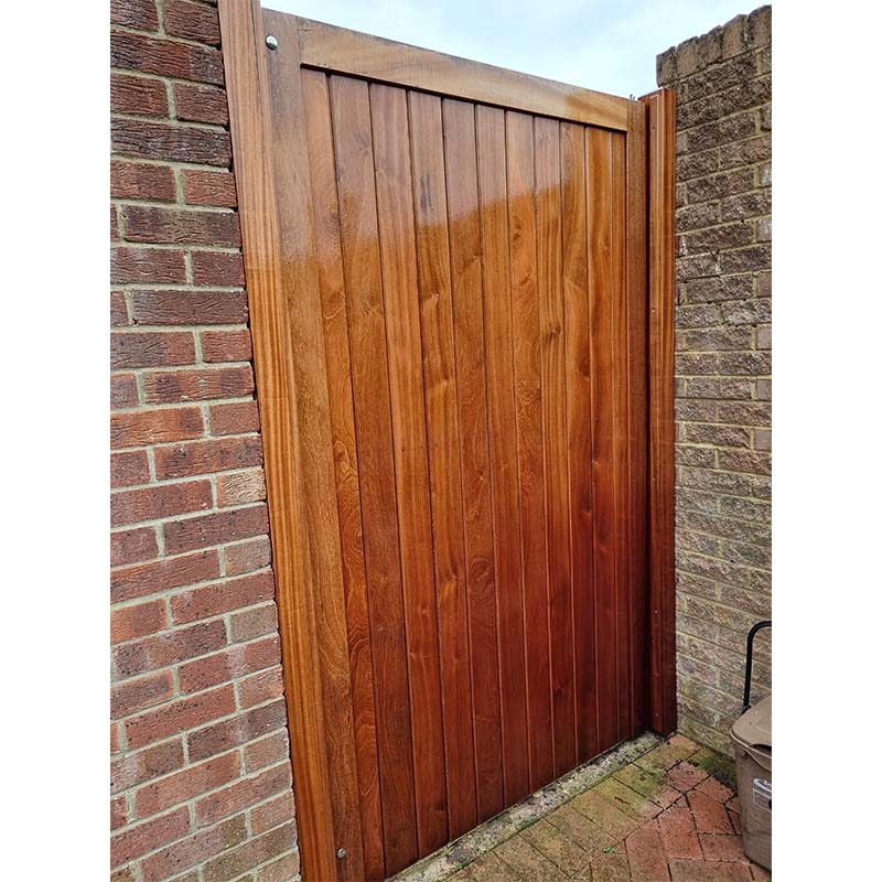 A gate coated with UV Cladding Protection Oil
